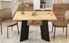 A dining table with chairs in a kitchen setting, featuring decorative elements and two cats. Produktbild-Vorschau