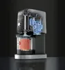 A cutaway view of a Ninja Creami ice cream maker, showing its internal mechanisms and a container filled with a pink mixture. Podgląd zdjęcia produktu