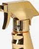 A close-up shot of the top part of a gold-colored spray bottle. Produktbild-Vorschau