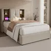 A bedroom scene featuring a bed with a headboard that has built-in shelves. Anteprima dell’immagine prodotto