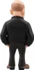 The back view of a small figurine of a bald man wearing a black jacket and brown pants. Podgląd zdjęcia produktu