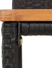 A close-up view of the corner of a black rattan chair with a wooden top edge and a metal bracket. Produktbild-Vorschau