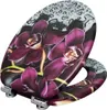 A toilet seat with a floral design. Anteprima dell’immagine prodotto