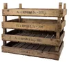 A stack of four wooden crates, each with text and a year stamped on the front. Produktbild-Vorschau