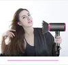 A woman is holding a hairdryer and touching her hair. Produktbild-Vorschau