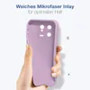 A hand holding a purple phone case with a white background. Produktbild-Vorschau