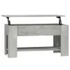 A concrete-effect lift-top coffee table shown from the front. Náhľad obrázku produktu