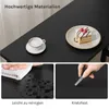 A collage showing a black table with a cup of coffee and a slice of cake, and two close-up shots demonstrating its ease of cleaning and scratch resistance. Náhľad obrázku produktu