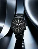 A black Citizen Eco-Drive chronograph men's watch is displayed against a dark, metallic background with dramatic lighting. Náhled obrázku produktu