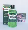 A bottle of Proraso aftershave lotion and its box are displayed on a white background, with a small postcard featuring a man in the background. Anteprima dell’immagine prodotto