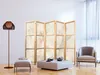 A living room scene with a folding screen, armchair, ottoman, coffee table, and floor lamp. Náhled obrázku produktu