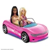 Two Barbie dolls are sitting in a pink convertible. Náhľad obrázku produktu
