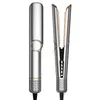 A studio shot of a hair dryer and hair straightener against a white background. Produktbild-Vorschau