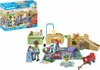 A Playmobil nursery playset with figures and accessories, shown both in its packaging and assembled. Produktbild-Vorschau