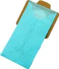 A blue paper filter set is attached to a brown cardboard backing. Produktbild-Vorschau