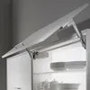 A close-up view of an open kitchen cabinet with a lift-up door mechanism. Produktbild-Vorschau