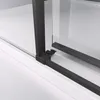 A close-up view of the corner of a shower enclosure, showing the black frame and glass. Produktbild-Vorschau