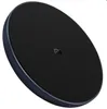 A black wireless charging pad with a dark blue rim, featuring the 'MI' logo in the center. Produktbild-Vorschau