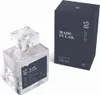 A perfume bottle and its packaging are displayed on a white background. Podgląd zdjęcia produktu