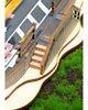 A close-up view of a miniature model of a station with cherry blossoms. Produktbild-Vorschau