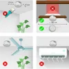 The image is a collage of four panels, each illustrating installation or placement guidelines for a smoke detector. The panels show correct and incorrect placements relative to walls, shelves, ceiling fans, and air conditioners, using checkmarks and crosse Produktbild-Vorschau