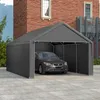 A gray carport tent with a car inside, set up on a paved surface in front of a brick building. Produktbild-Vorschau