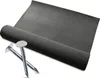 A roll of black bitumen roofing felt and two roofing nails are shown against a white background. Produktbild-Vorschau