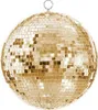 A gold disco ball hanging against a white background. Anteprima dell’immagine prodotto