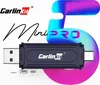 A product shot of a Carlinkit adapter with marketing graphics in the background. Produktbild-Vorschau