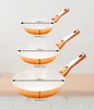 Three orange frying pans of different sizes are shown with dimensions and volume indicated. Produktbild-Vorschau
