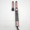 A hair styling tool with two attachments on a white background. Anteprima dell’immagine prodotto