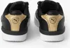 The back view of two black Puma sneakers with gold accents on a white background. Podgląd zdjęcia produktu