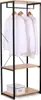 A freestanding clothing rack with multiple shelves and shirts hanging on it. Náhľad obrázku produktu