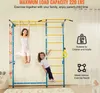 A mother and daughter are using a home gym climbing frame indoors. Anteprima dell’immagine prodotto