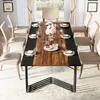 A dining table set up for a meal with chairs around it. Náhled obrázku produktu