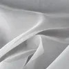 A close-up, draped view of white sheer fabric. Produktbild-Vorschau
