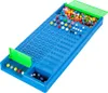 A blue Mastermind game board with colorful pegs and a compartment for pegs. Anteprima dell’immagine prodotto
