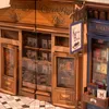 A miniature diorama of a bookshop and post office. Podgląd zdjęcia produktu
