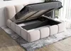 A bed with its storage compartment open, showing the mattress base and internal storage space. The bed is placed on a rug in a room. Produktbild-Vorschau