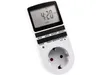 A white digital timer plug with a black LCD screen and buttons, shown against a white background. Produktbild-Vorschau