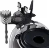 A close-up view of a cleaning brush and other accessories for a kitchen appliance. Produktbild-Vorschau