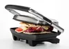 A sandwich being grilled in a panini press. Produktbild-Vorschau