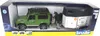 A toy Land Rover Defender with a horse trailer and a horse inside, displayed in its retail packaging. Produktbild-Vorschau