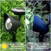 A split image showing a solar garden spotlight in use during the day and at night, with text overlays explaining its functions. Produktbild-Vorschau