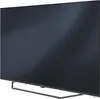 A side view of a modern flat-screen television on a stand. Produktbild-Vorschau