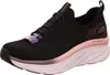 A single black Skechers D'Lux Walker sneaker with pink accents and a thick white sole is shown against a white background. Náhled obrázku produktu