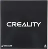 A black 3D printer heated bed with the Creality logo and warning text. Náhľad obrázku produktu