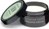 A jar of American Crew Forming Cream is shown with the lid open. Voir les images du produit