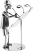 A metallic figurine of an architect standing at a drafting table with lights. Náhled obrázku produktu