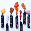 Several cans of hair mousse with colorful foam dispensed on top, arranged on a white background. Anteprima dell’immagine prodotto